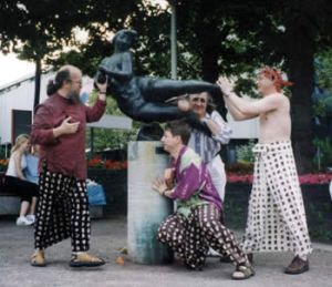 Russian Saxophonic Mafia forces Lorelle on quay of Rhein. 